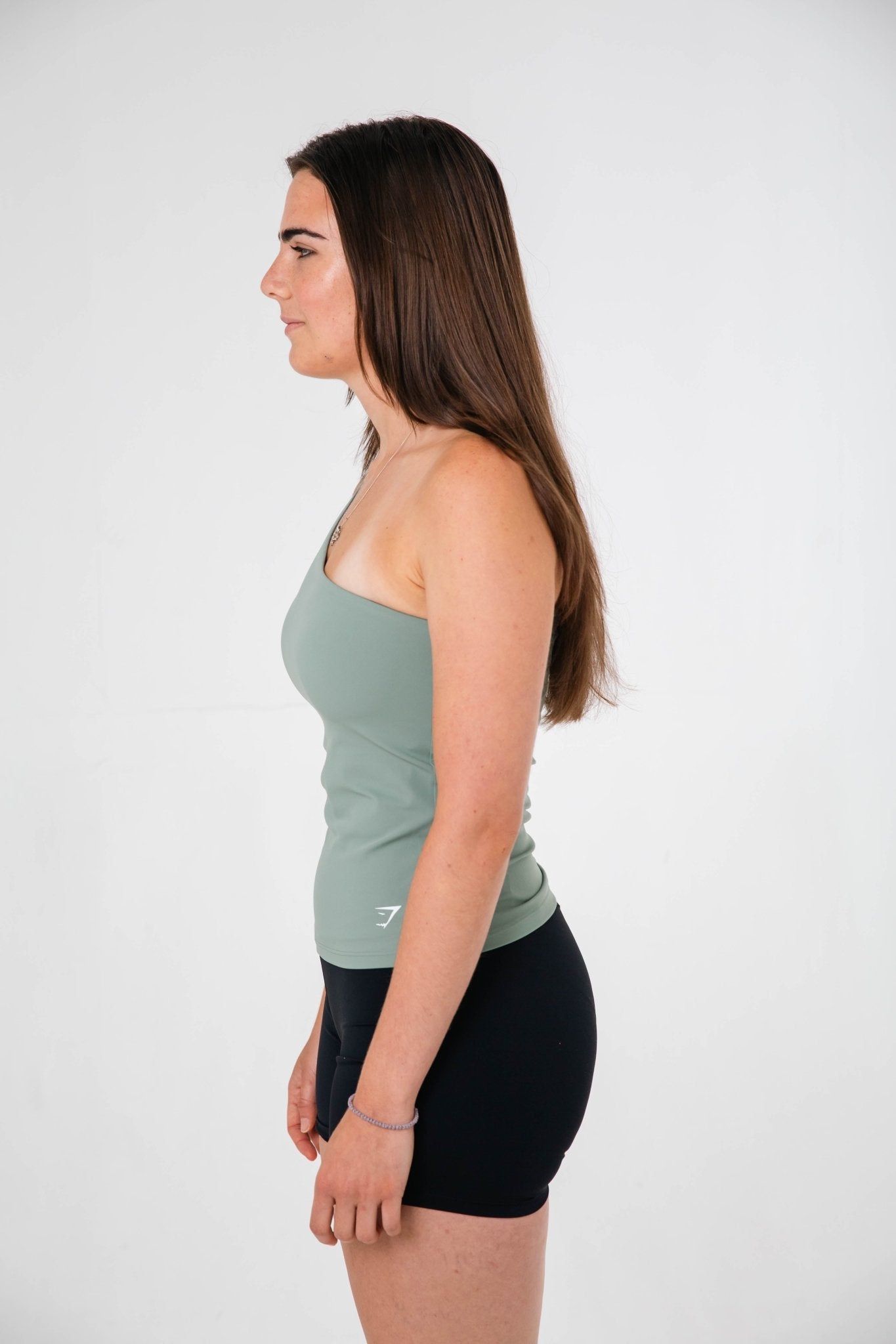 Gymshark Green Asymmetric Shelf Tank - GYM THREADS