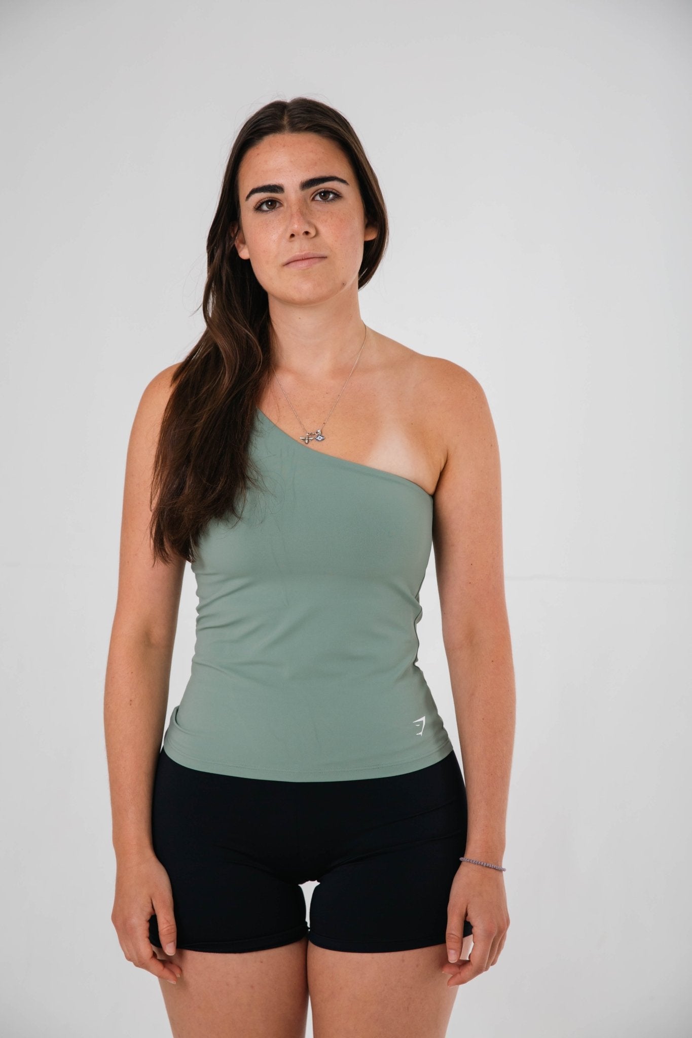 Gymshark Green Asymmetric Shelf Tank - GYM THREADS